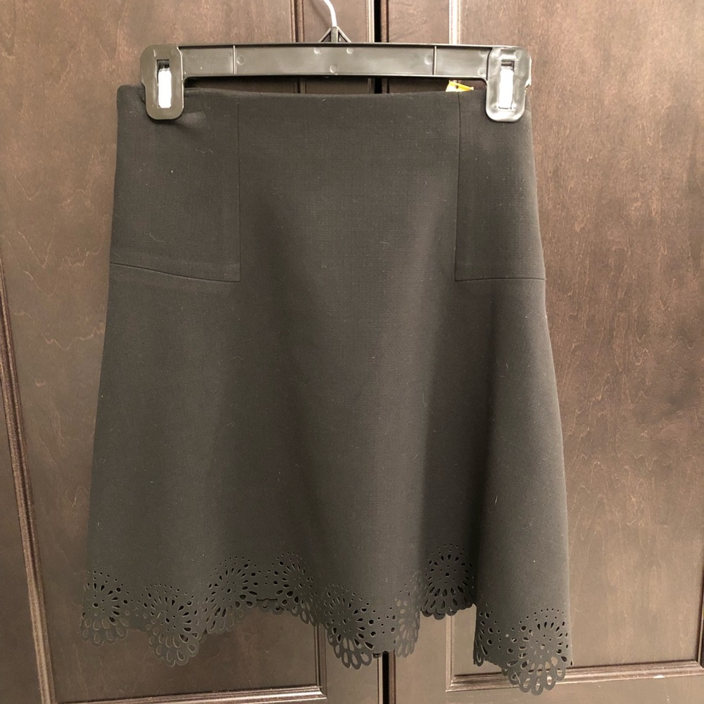 Black skirt with laser cut floral trim